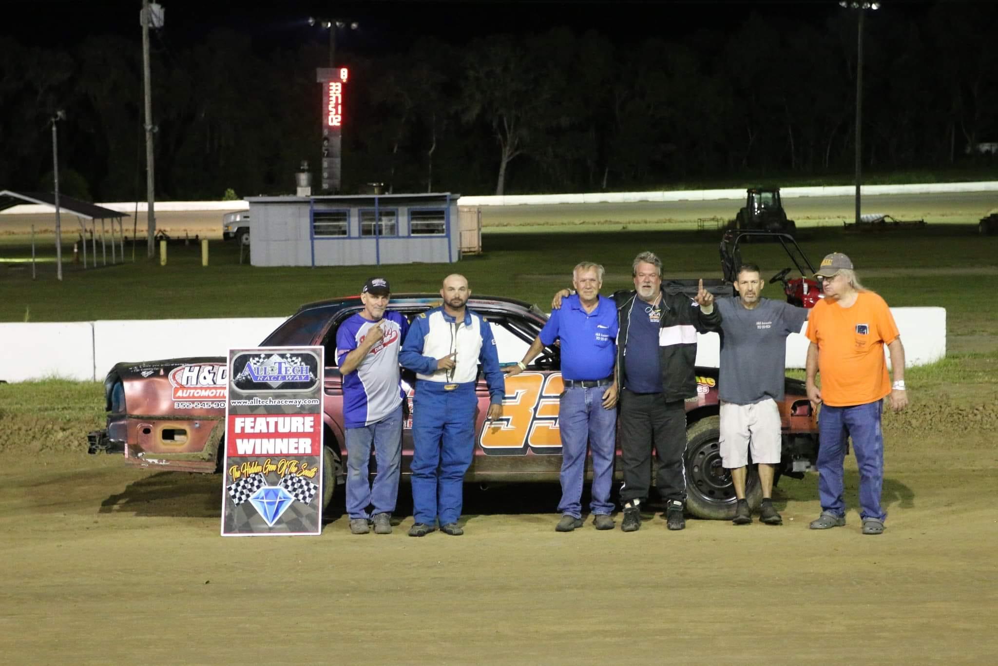 Crown Vics with another exciting night. Here's James Erickson and his team as they celebrate a victory at All Tech.