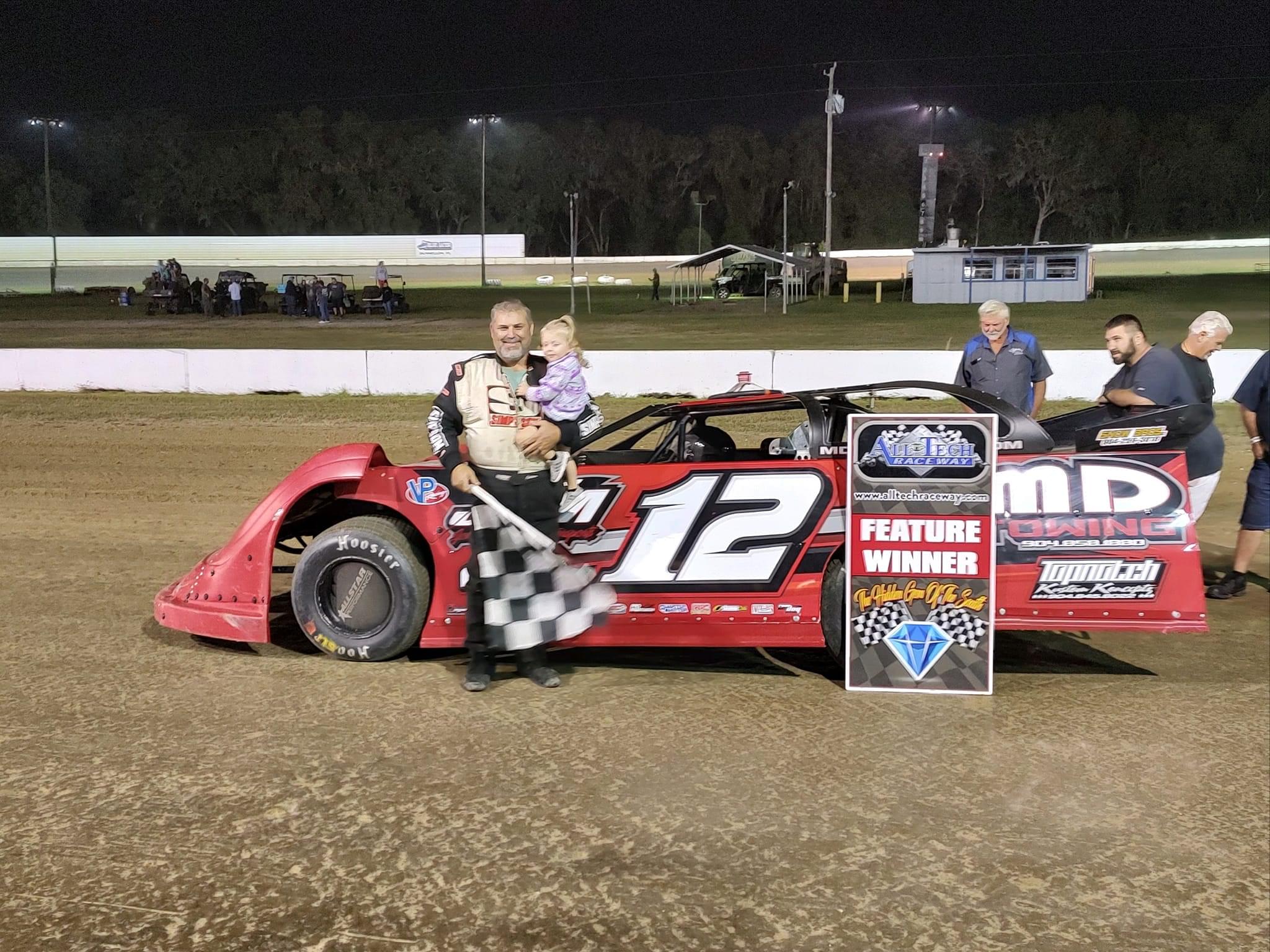 A very happy Johnny Collins in All Tech Raceway victory lane last night in 602 Late Models.